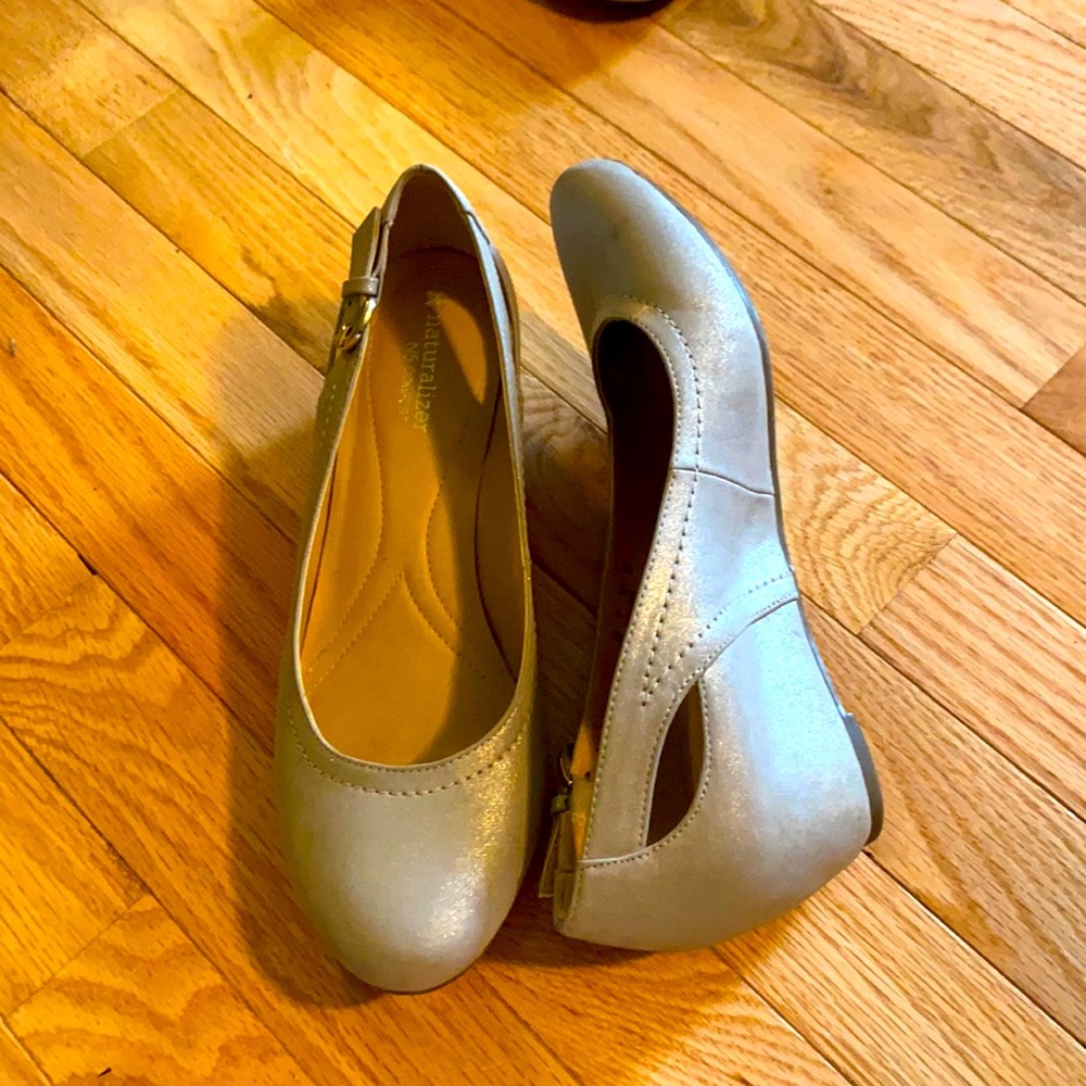 Metallic covered heel slide shoe